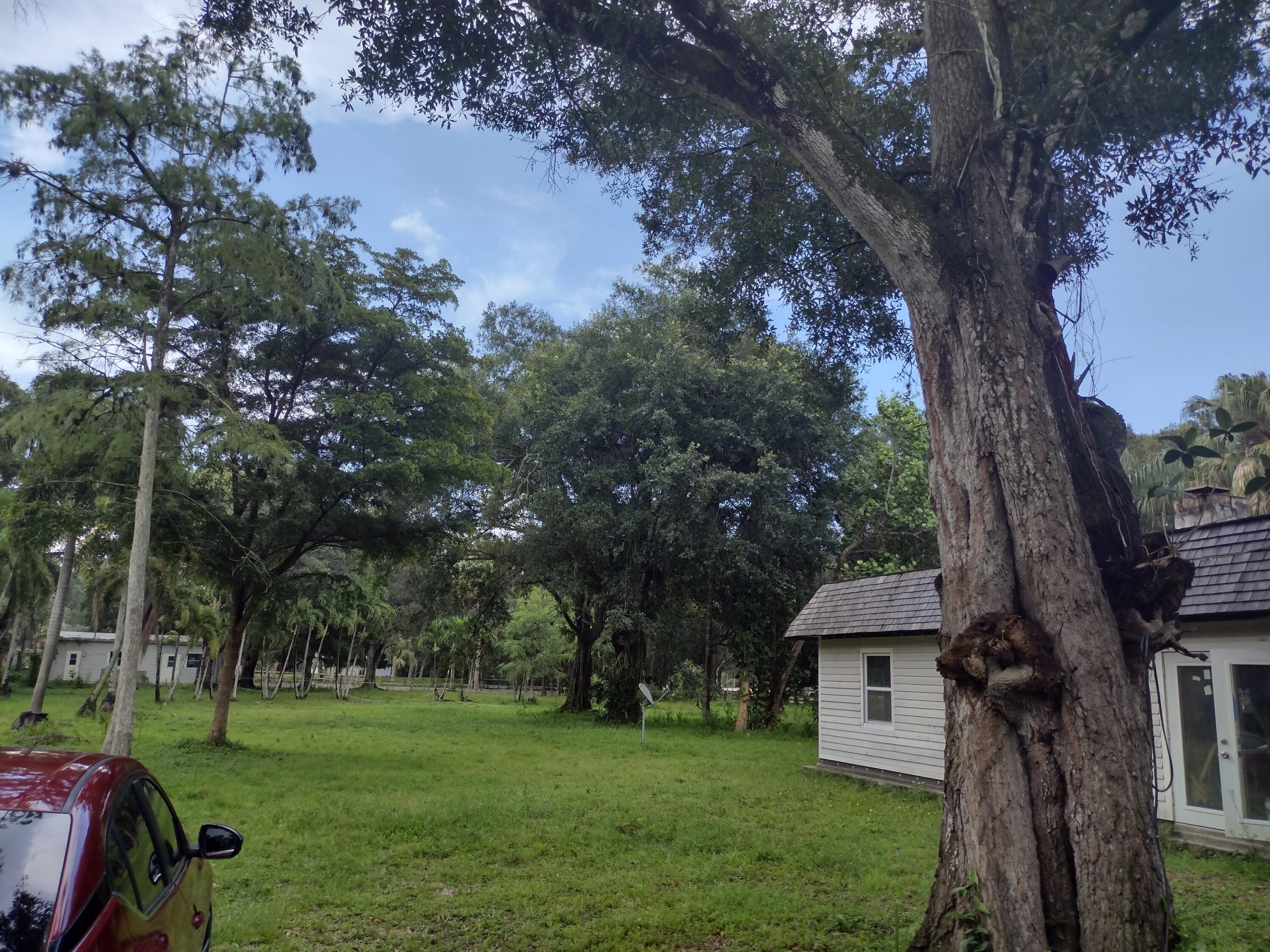 Property Photo:  14717 Collecting Canal Road  FL 33470 