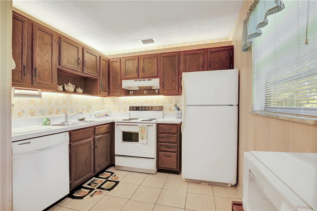 Property Photo:  48 Woodland Drive 106  FL 32962 