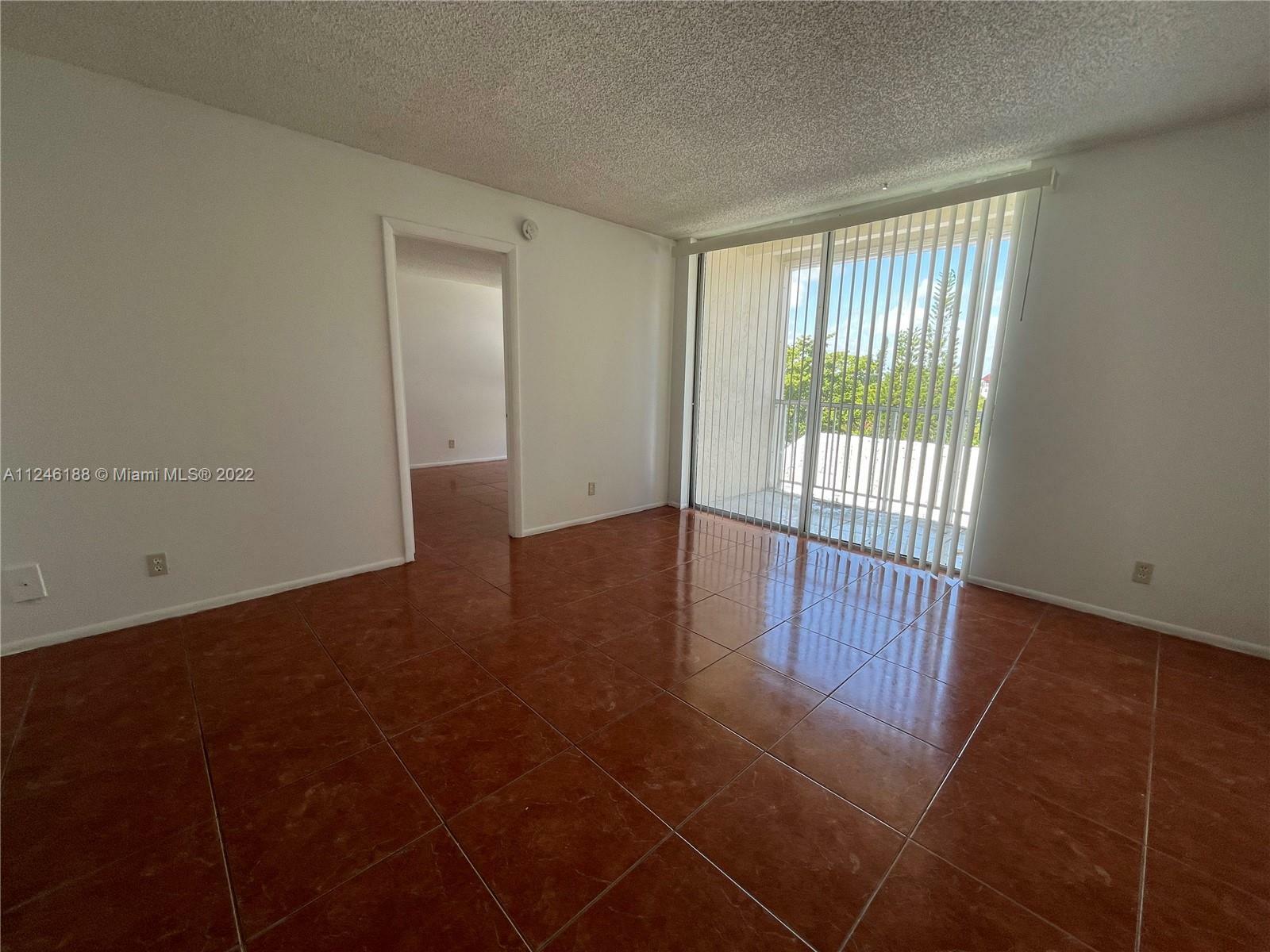 Property Photo:  2029 NW 46th Ave E405  FL 33313 