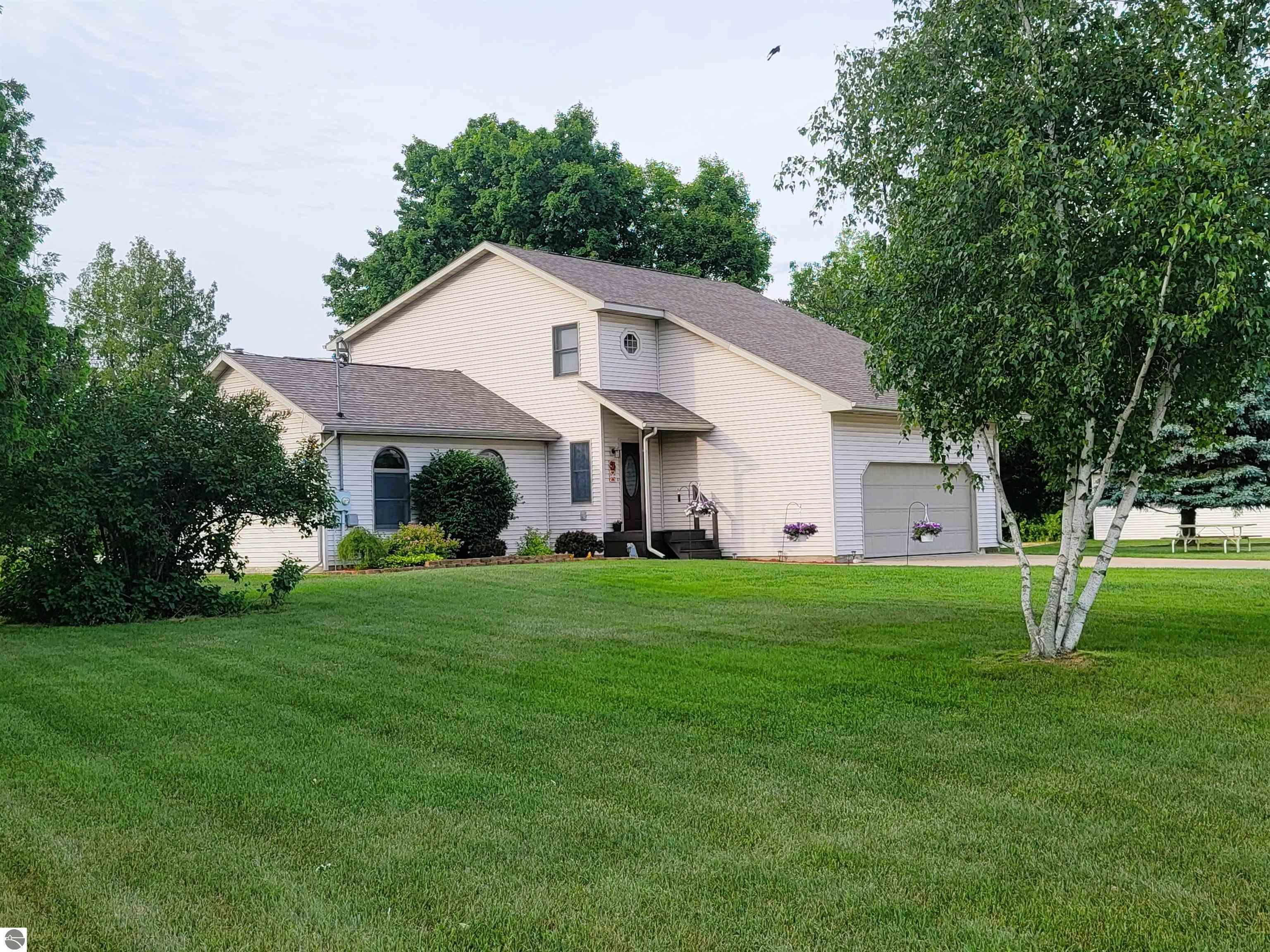 Property Photo:  4815 E Washington Road  MI 48617 