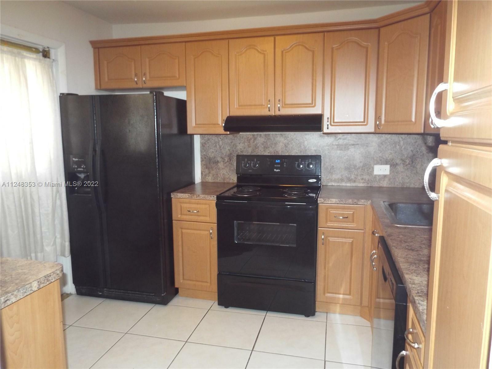 Property Photo:  443 NE 195th St 135  FL 33179 