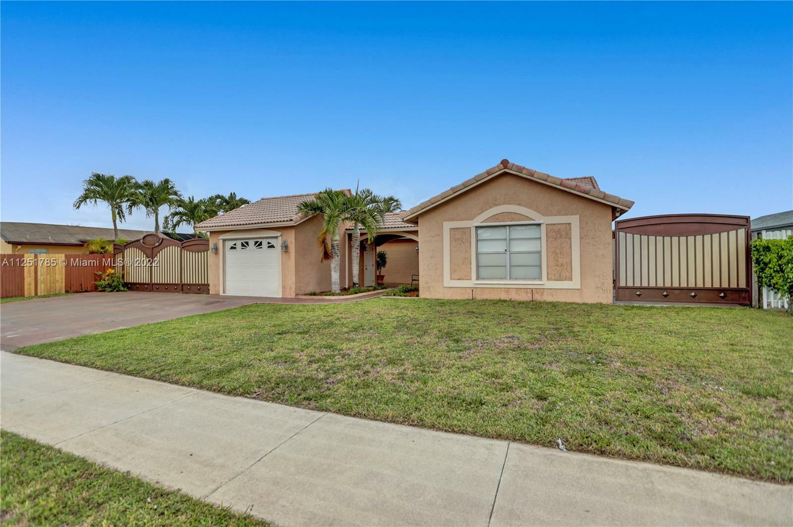 Property Photo:  19634 NW 58th Ct  FL 33015 