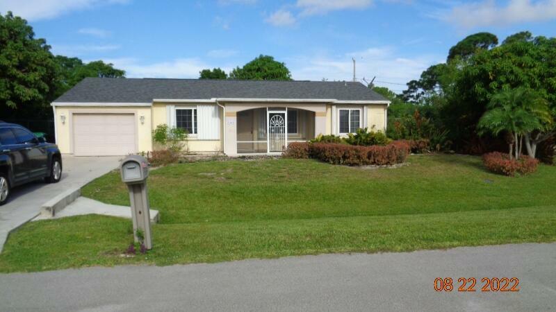 Property Photo:  2302 SE Merrill Road  FL 34952 