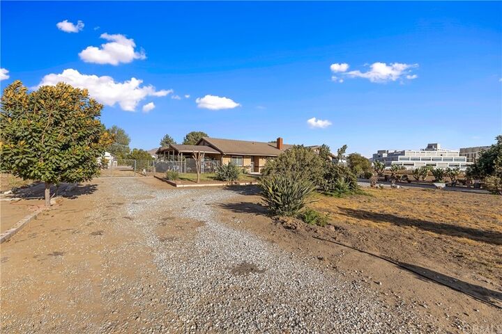Property Photo:  14190 Blue Ribbon Lane  CA 92555 