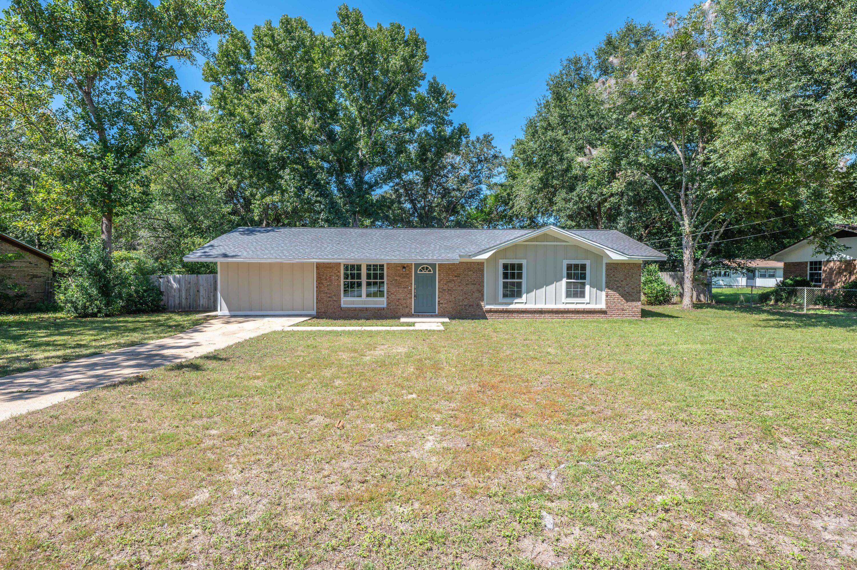 Property Photo:  1303 Sunshine Drive  FL 32539 