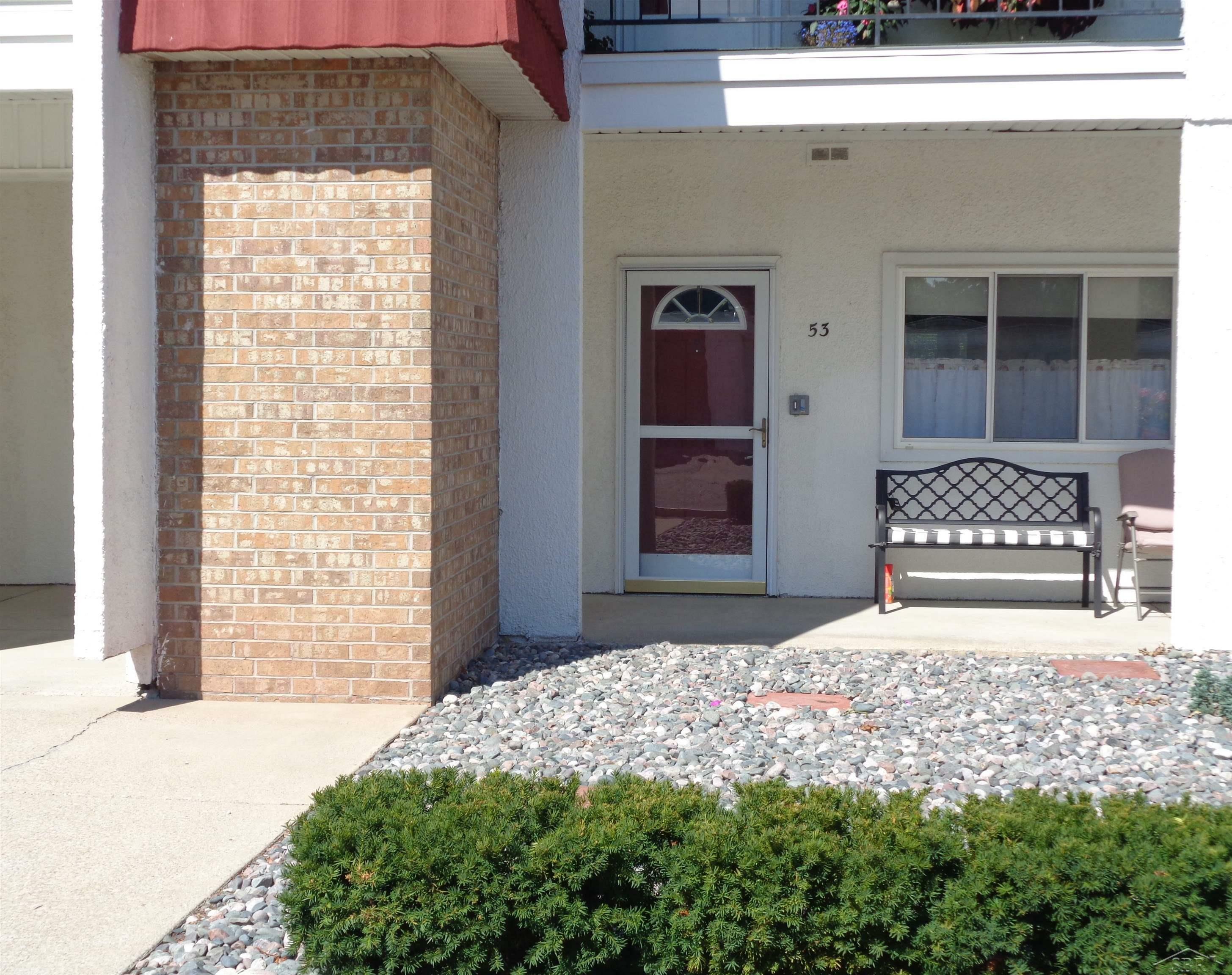 Property Photo:  9030 Greenway Blvd. D-53 D53  MI 48609 