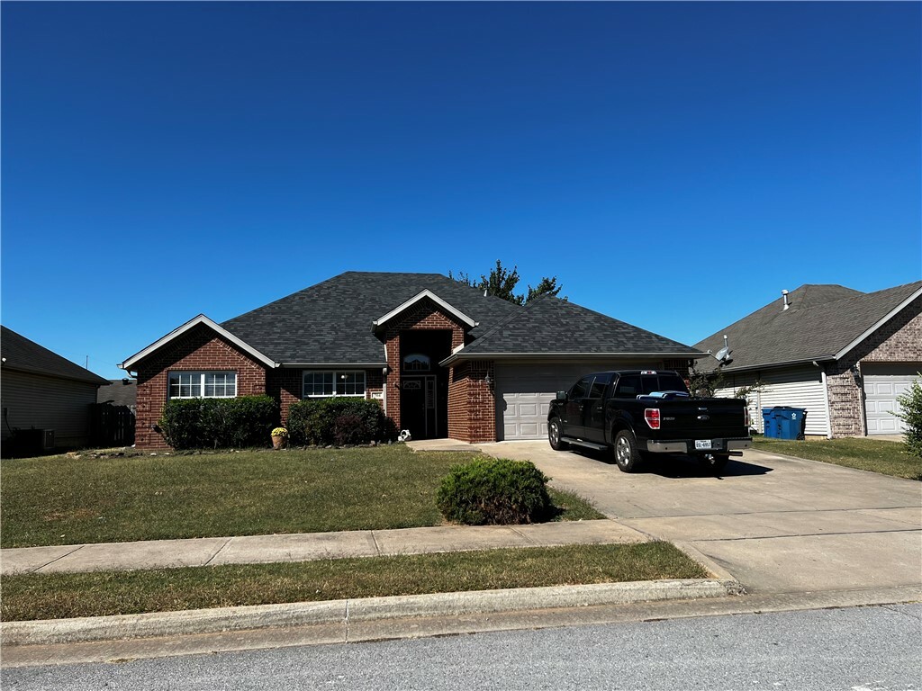 Property Photo:  704 SW River Rock Street  AR 72712 