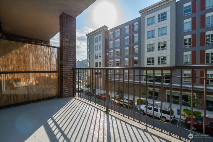 Property Photo:  4961 Main Street 415  WA 98407 