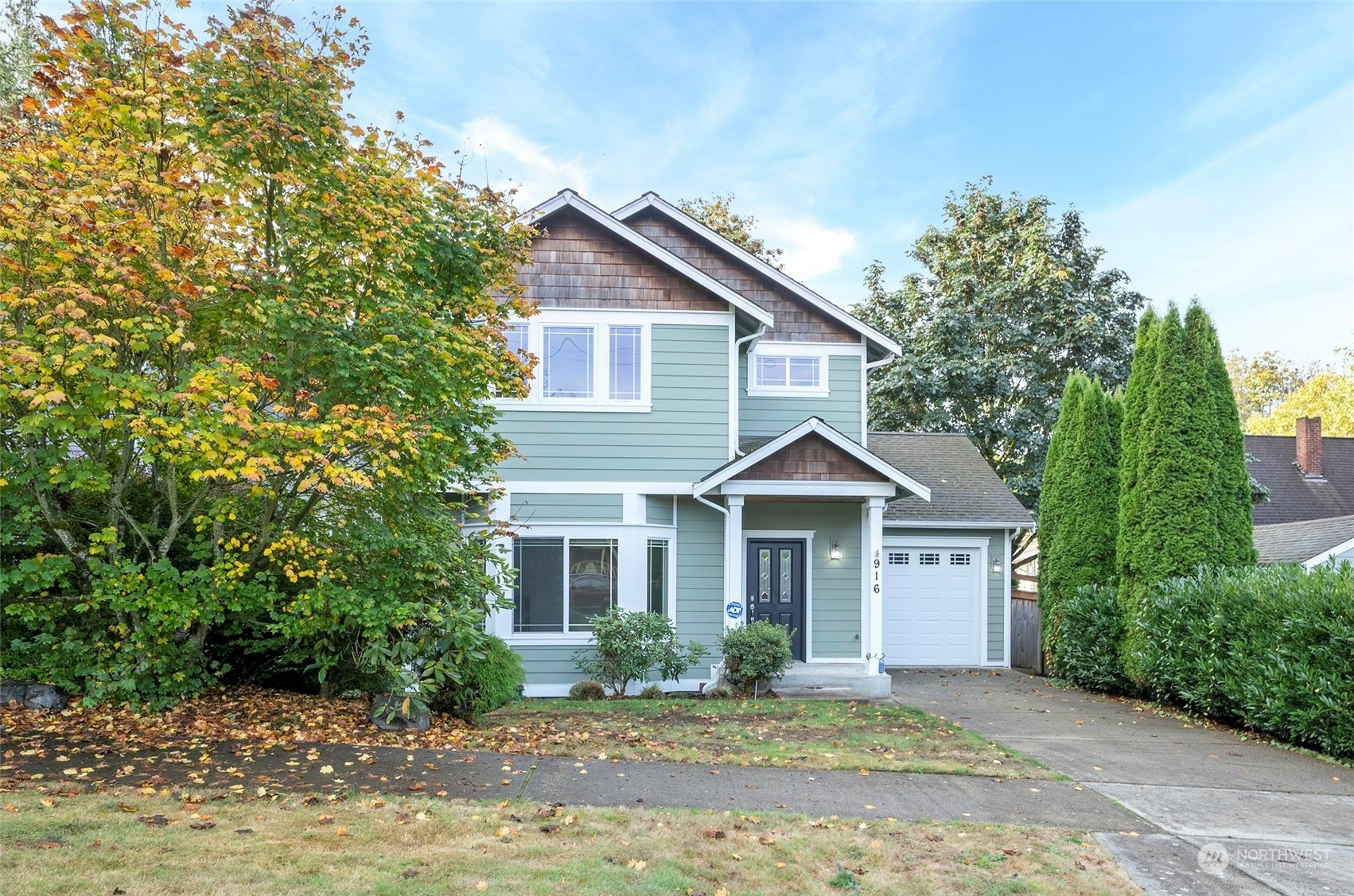 Property Photo:  916 N Cushman Avenue  WA 98403 