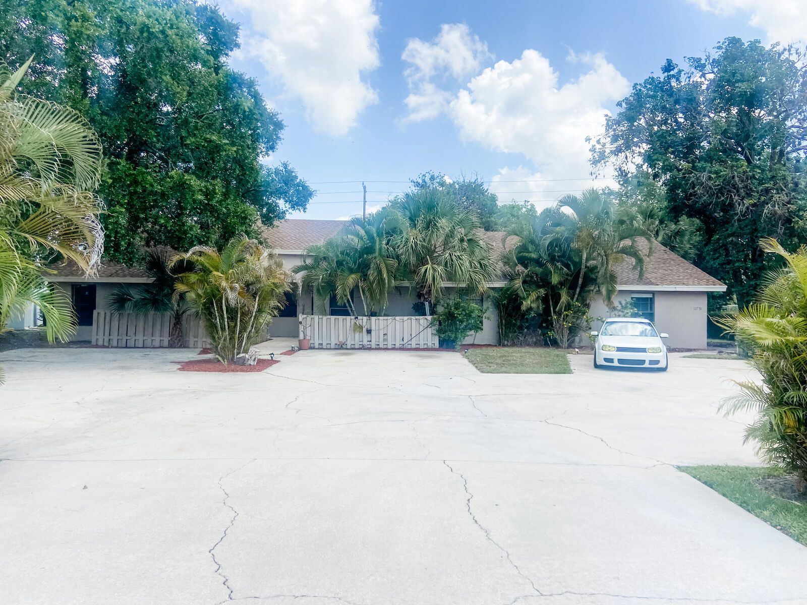 Property Photo: 12772 Peconic Court 12718 FL 33414