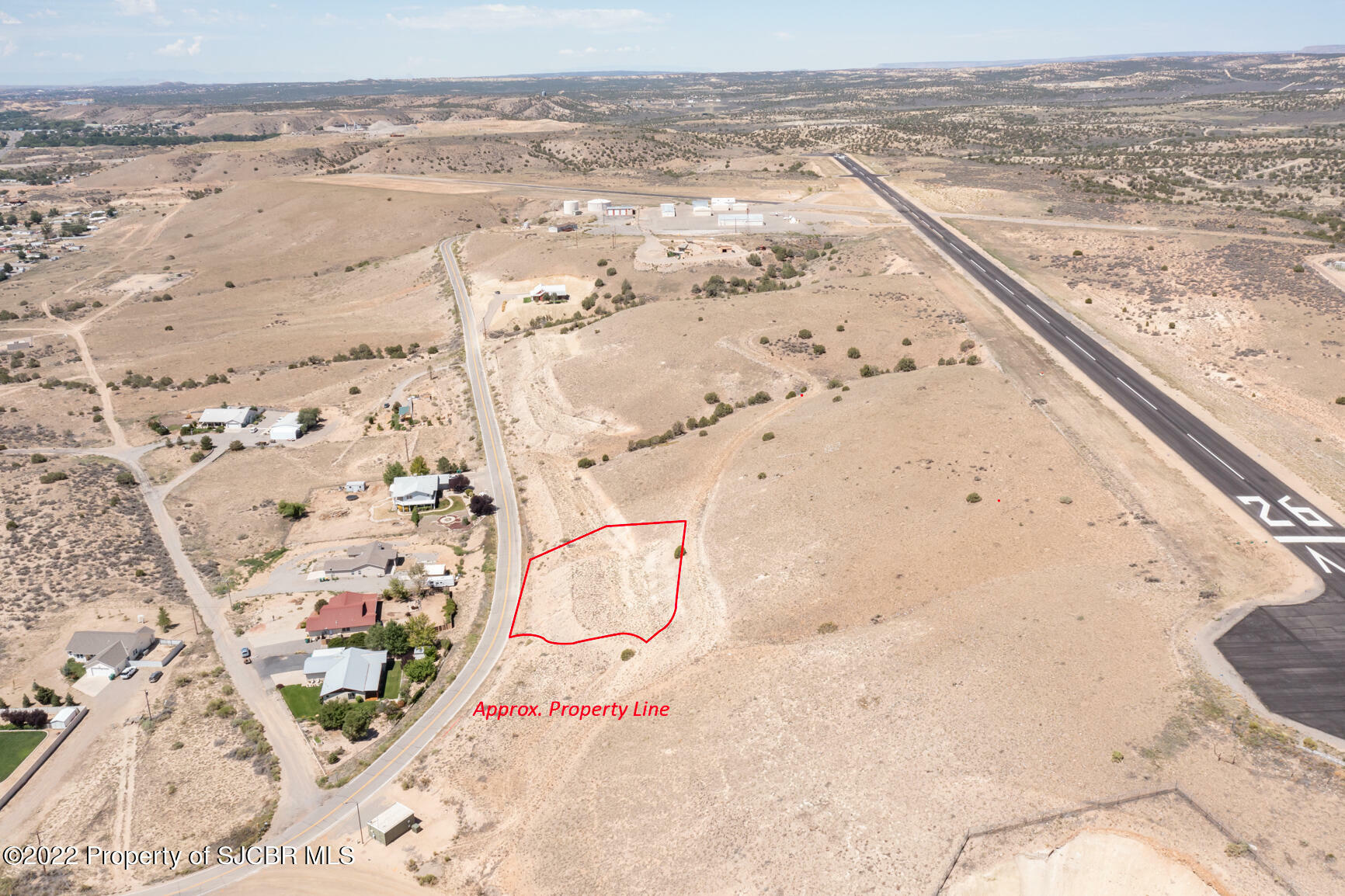 Property Photo:  705 Airport Drive  NM 87410 