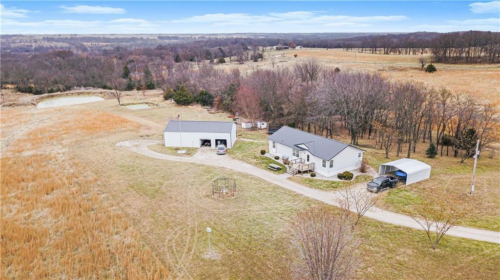 Property Photo:  2406 NE County Road 10483 Road  MO 64730 