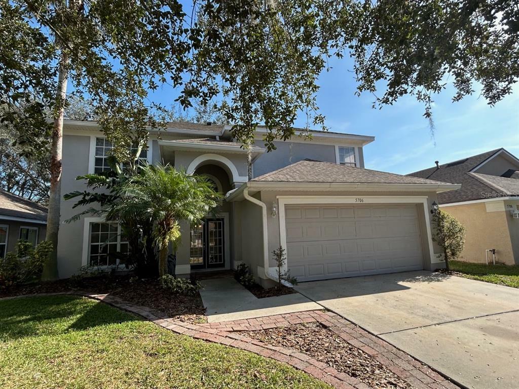 Property Photo: 5706 Hawkgrove Place FL 33547