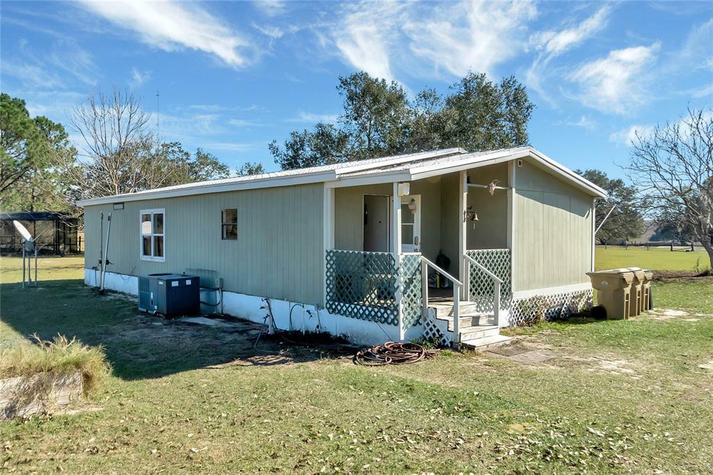 Property Photo:  7743 E Dewey Robbins Road  FL 34737 