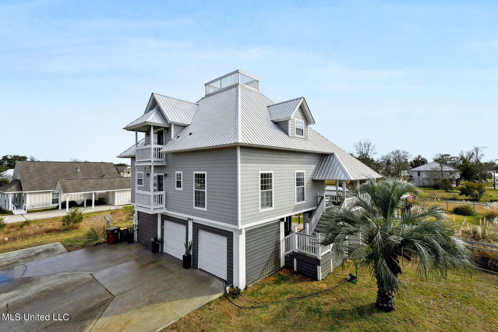 Property Photo:  201 Oak Gardens Avenue  MS 39560 