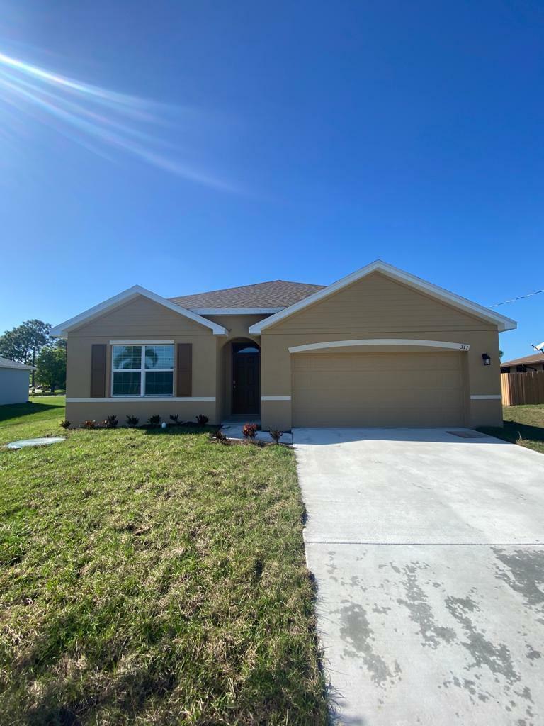 Property Photo:  311 SW Aero Circle  FL 34953 