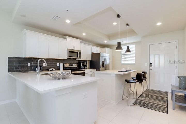 Property Photo: 4741 Clock Tower Drive 105 FL 34746