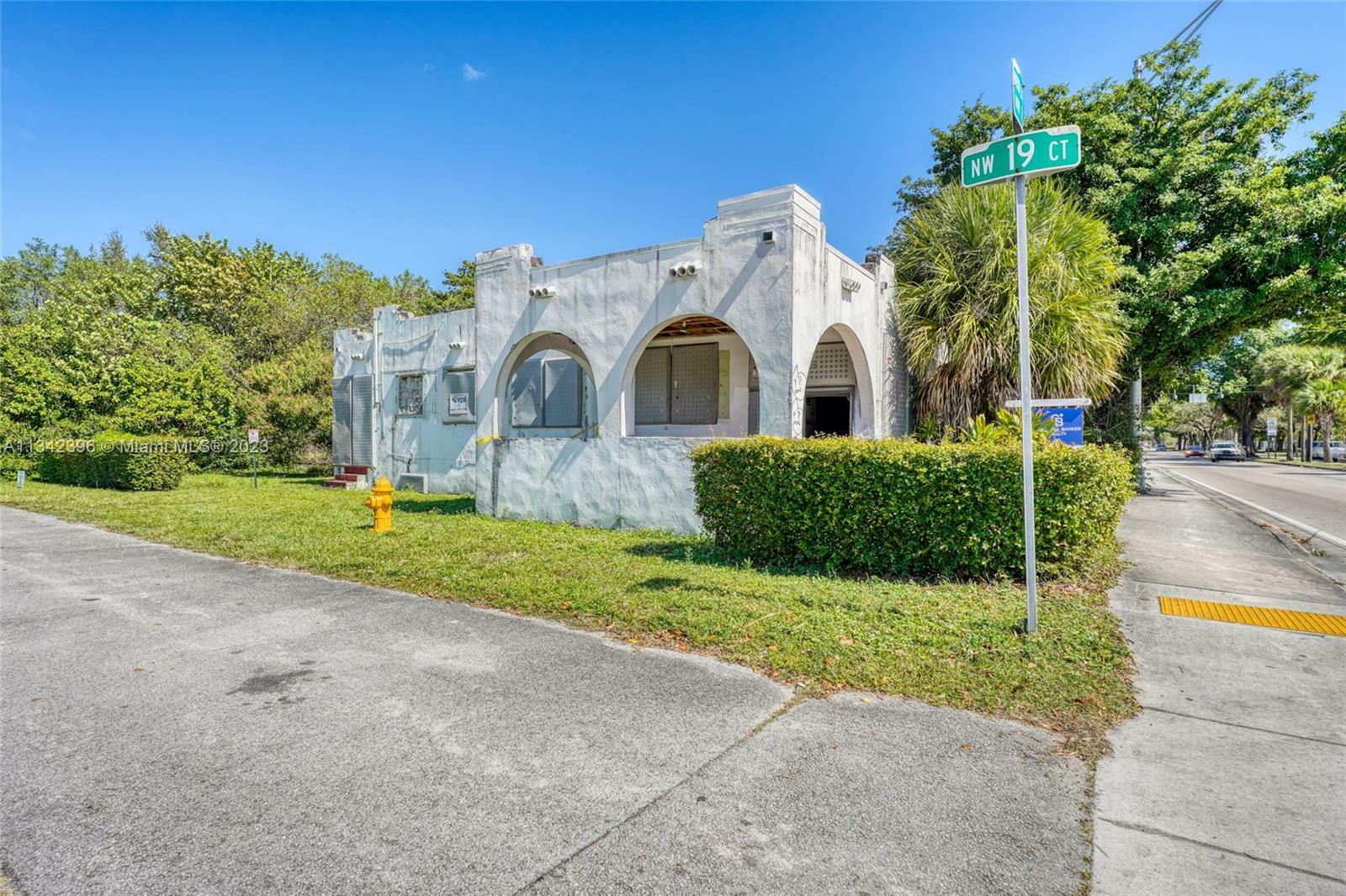 Property Photo:  1909 NW 62nd St  FL 33147 