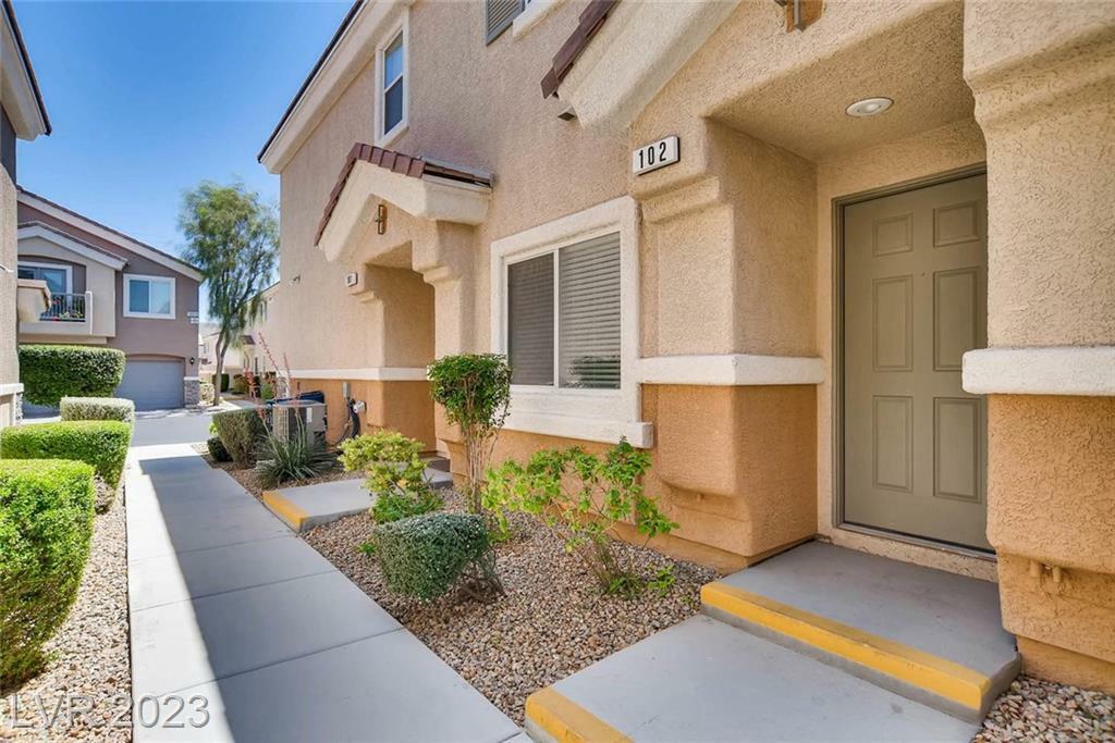 Property Photo:  10023 Aspen Rose Street 102  NV 89183 