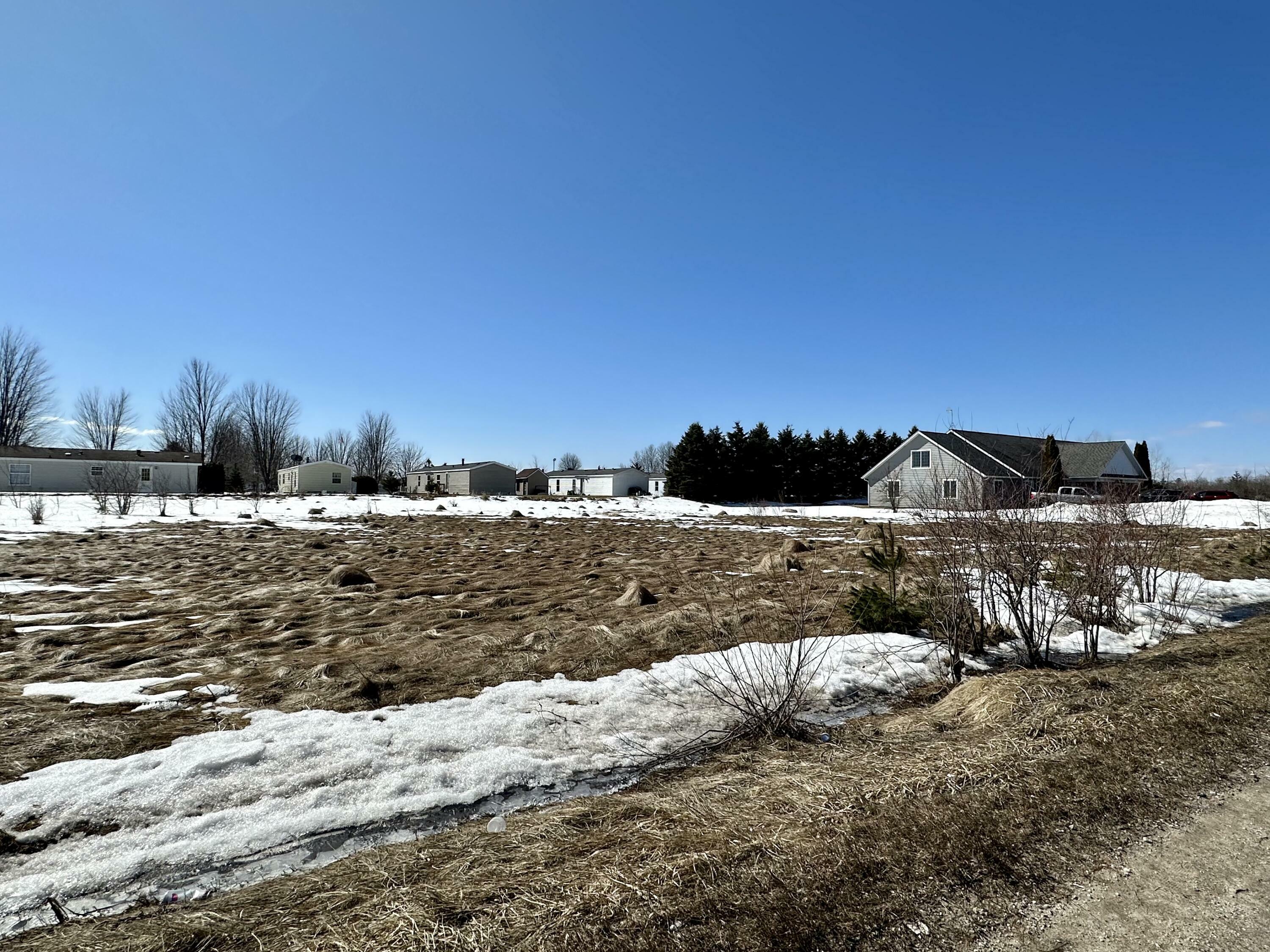 Property Photo:  515 Stempky Street Parcel B .43 Acres  MI 49721 