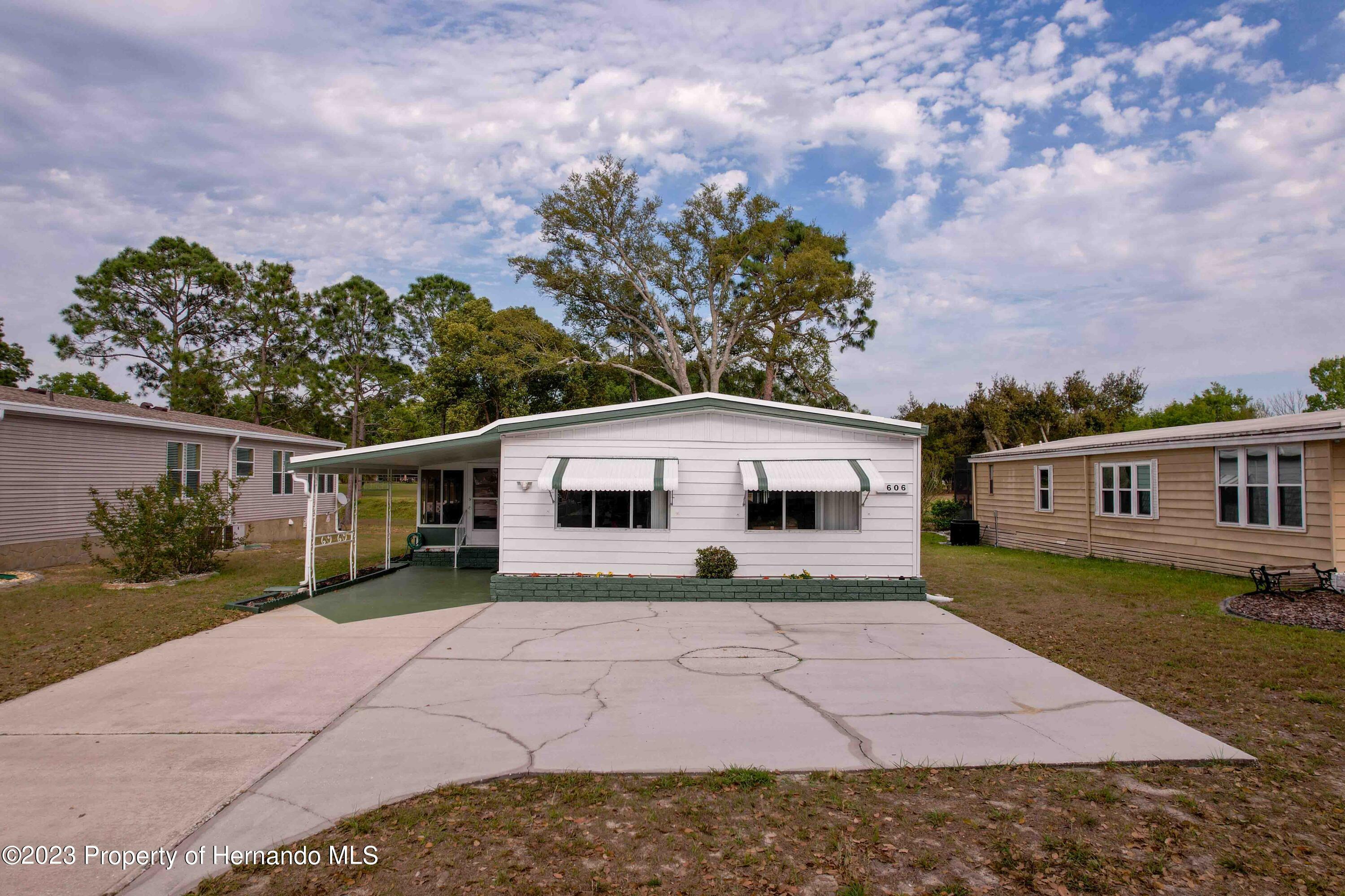 Property Photo:  7606 Dinsmore Street  FL 34613 