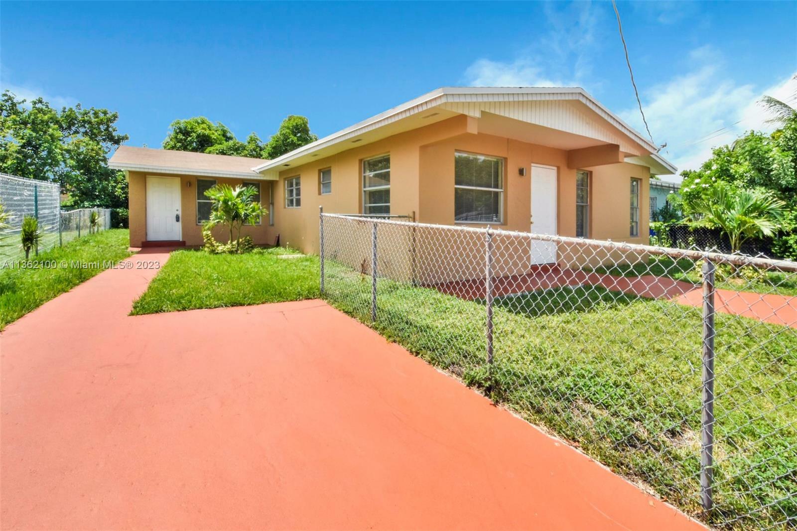 Property Photo:  1034 NW 25th St  FL 33127 