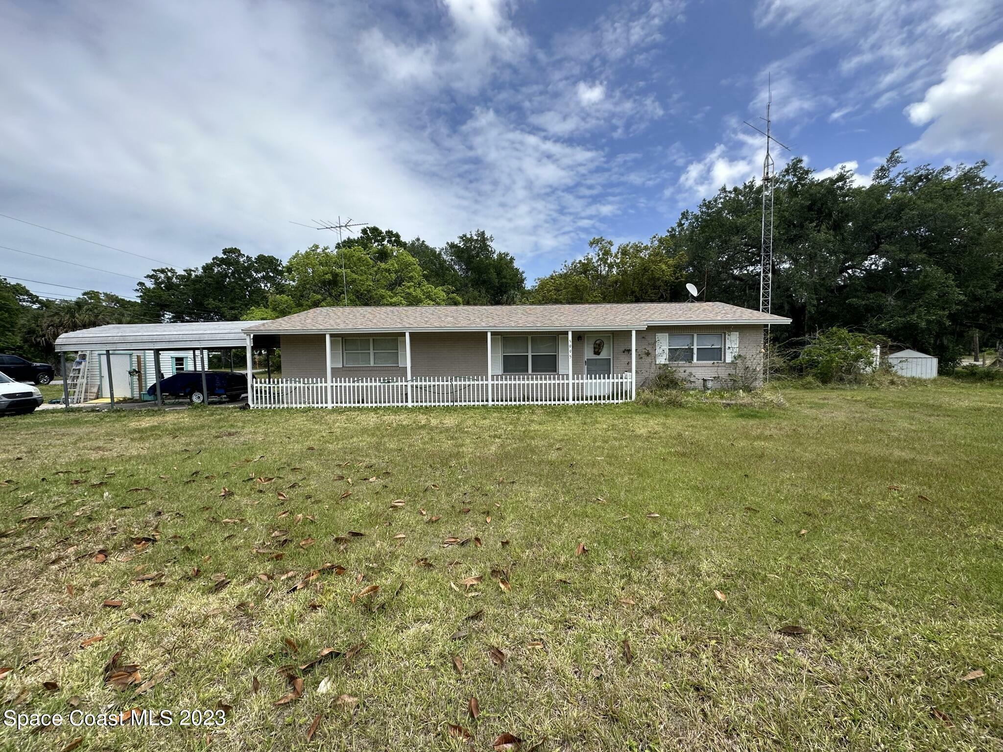 Property Photo:  5995 Palm Street  FL 32754 