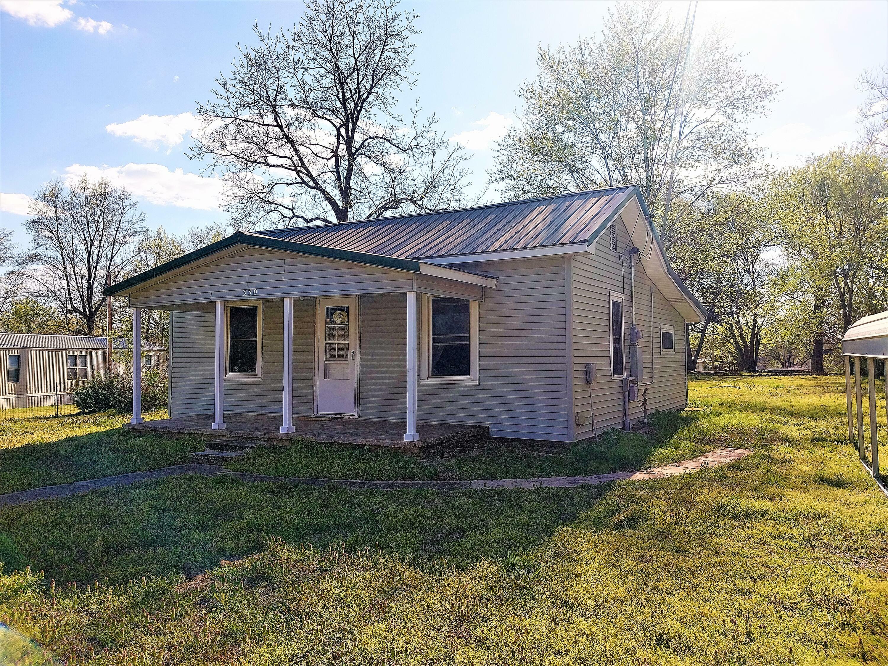 Property Photo:  330 S Grove Street  MO 64844 