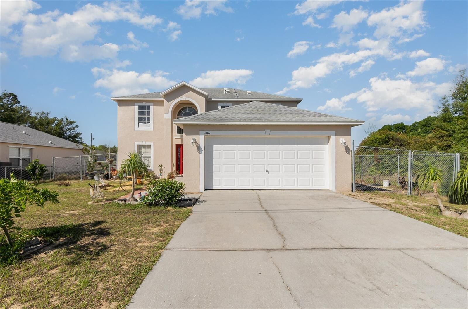 Property Photo:  406 Naples Court  FL 34759 