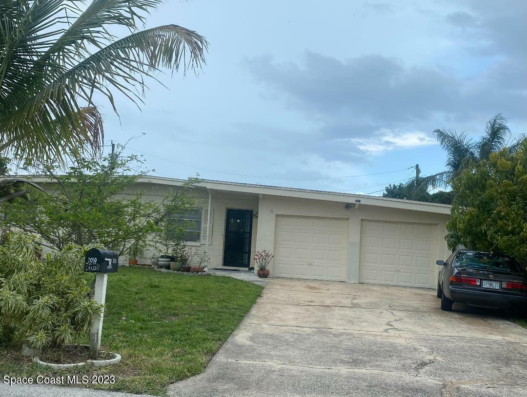 Property Photo:  2050 Temple Avenue  FL 32953 