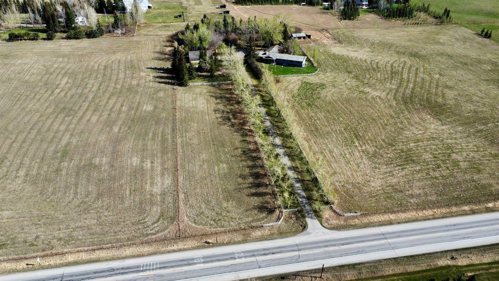 Property Photo: 30226 Springbank Road AB T3Z3L9
