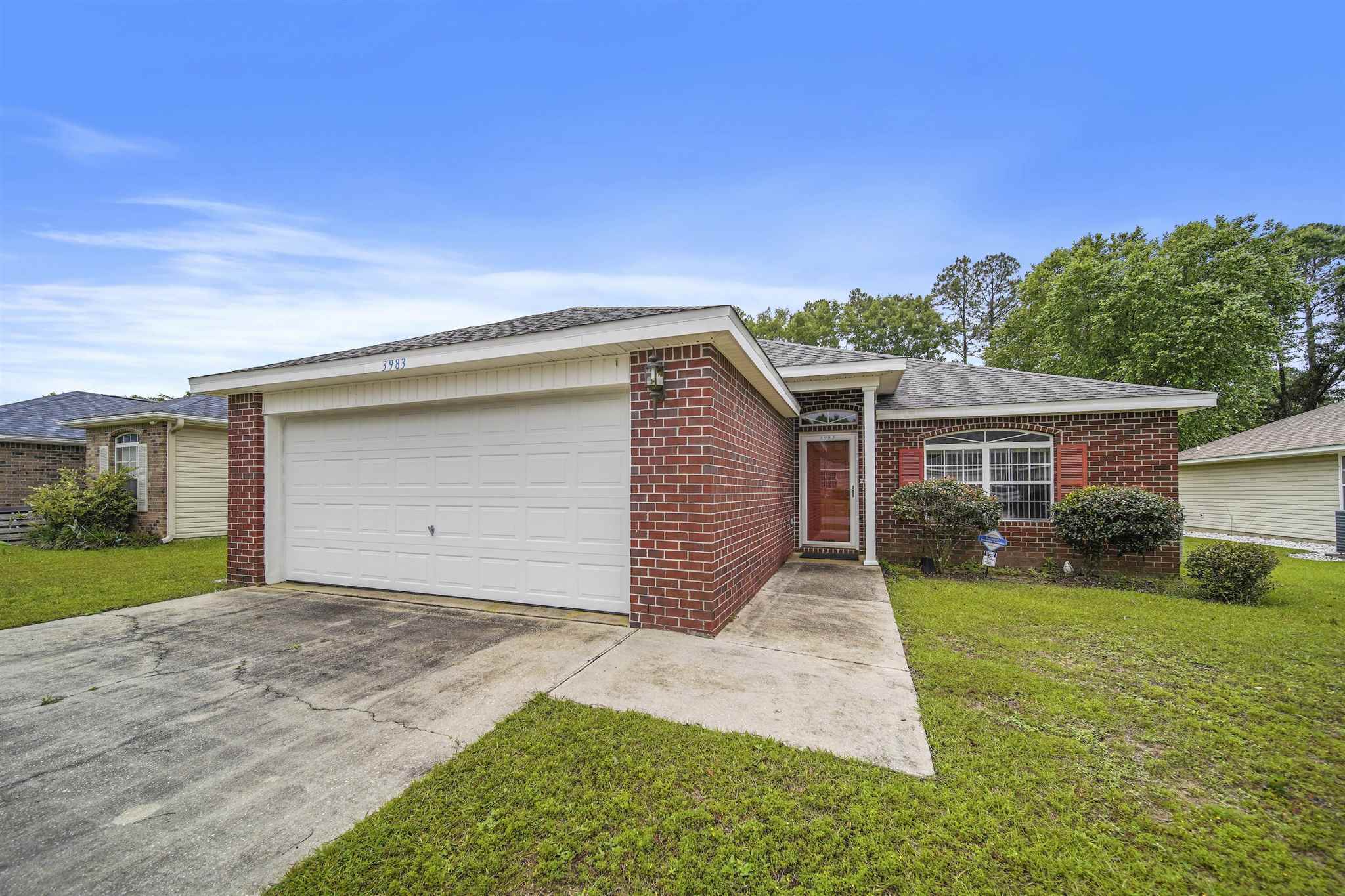 Property Photo:  3983 Omega St  FL 32571 