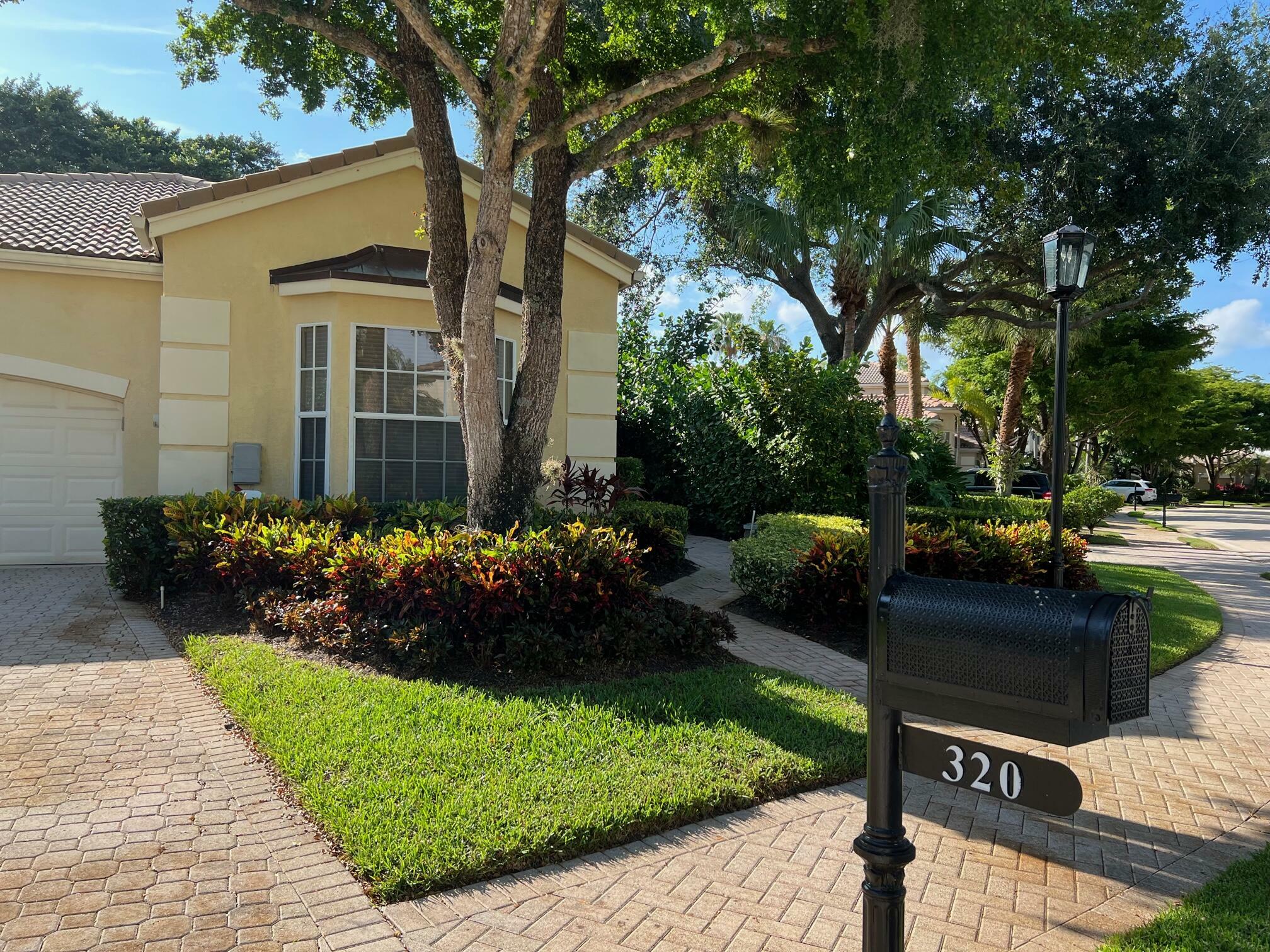 Property Photo:  320 Sunset Bay Lane  FL 33418 