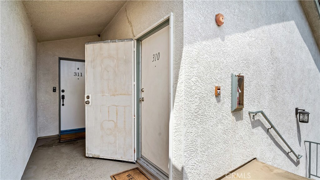 Property Photo:  15000 Downey Avenue 310  CA 90723 