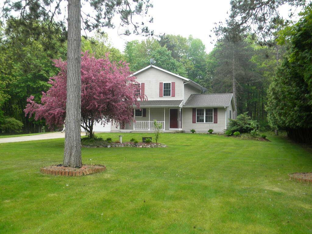 Property Photo:  4836 Red Pine Drive  MI 49327 