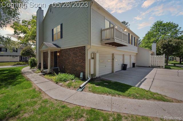 Property Photo:  2128 Hidden  Meadows  Drive D  MI 48390 