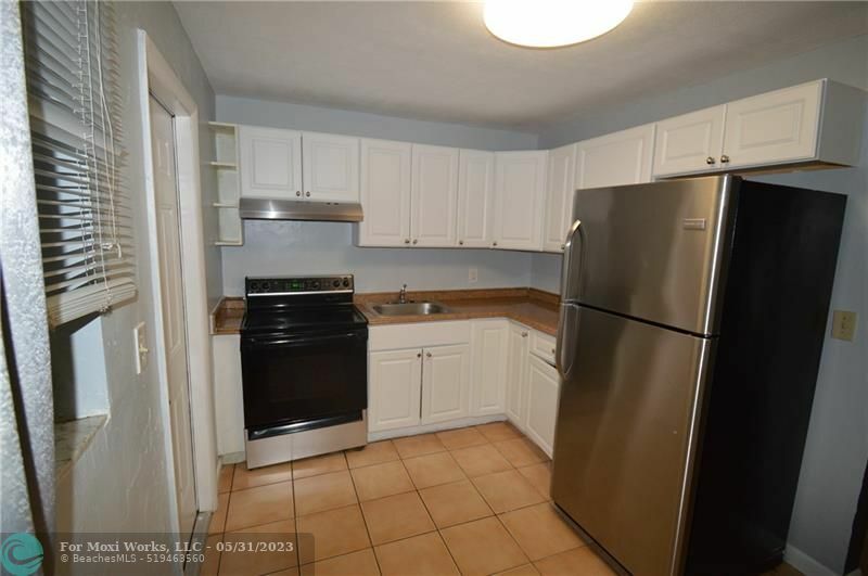Property Photo:  807 Phippen Waiters Rd 1  FL 33004 