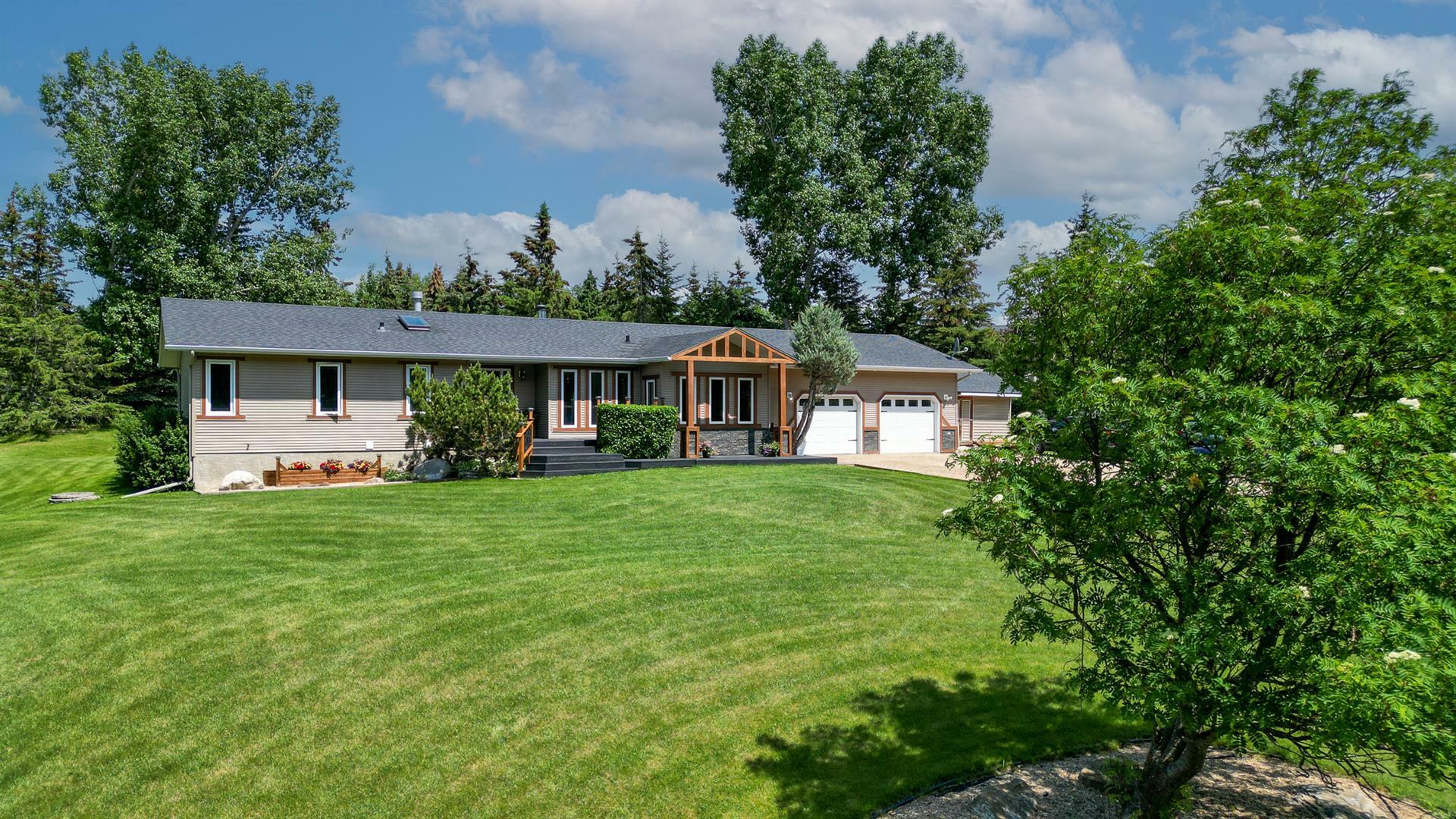 Property Photo: 170 28319 Twp Rd 384 AB T4S 2A4