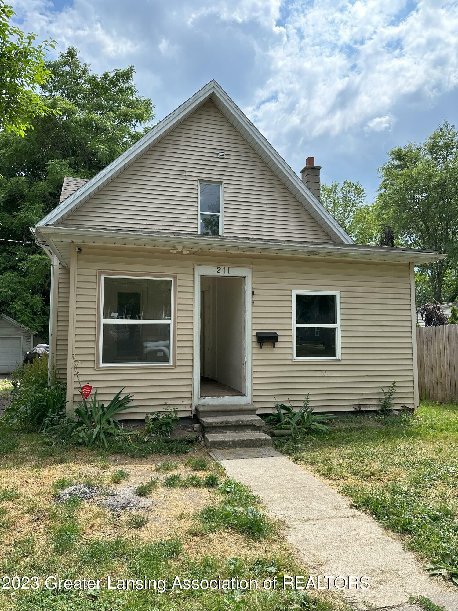 Property Photo:  211 W Barnes Avenue  MI 48910 