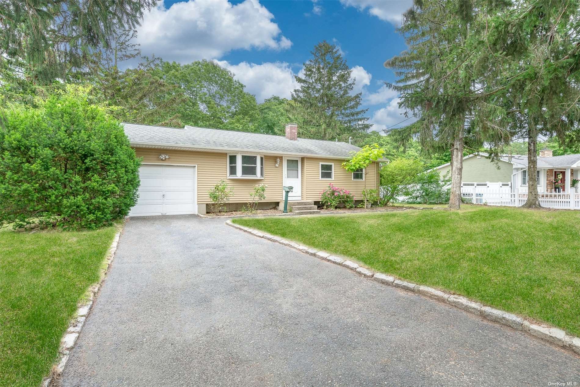 Property Photo:  124 Fawn Lane  NY 11720 