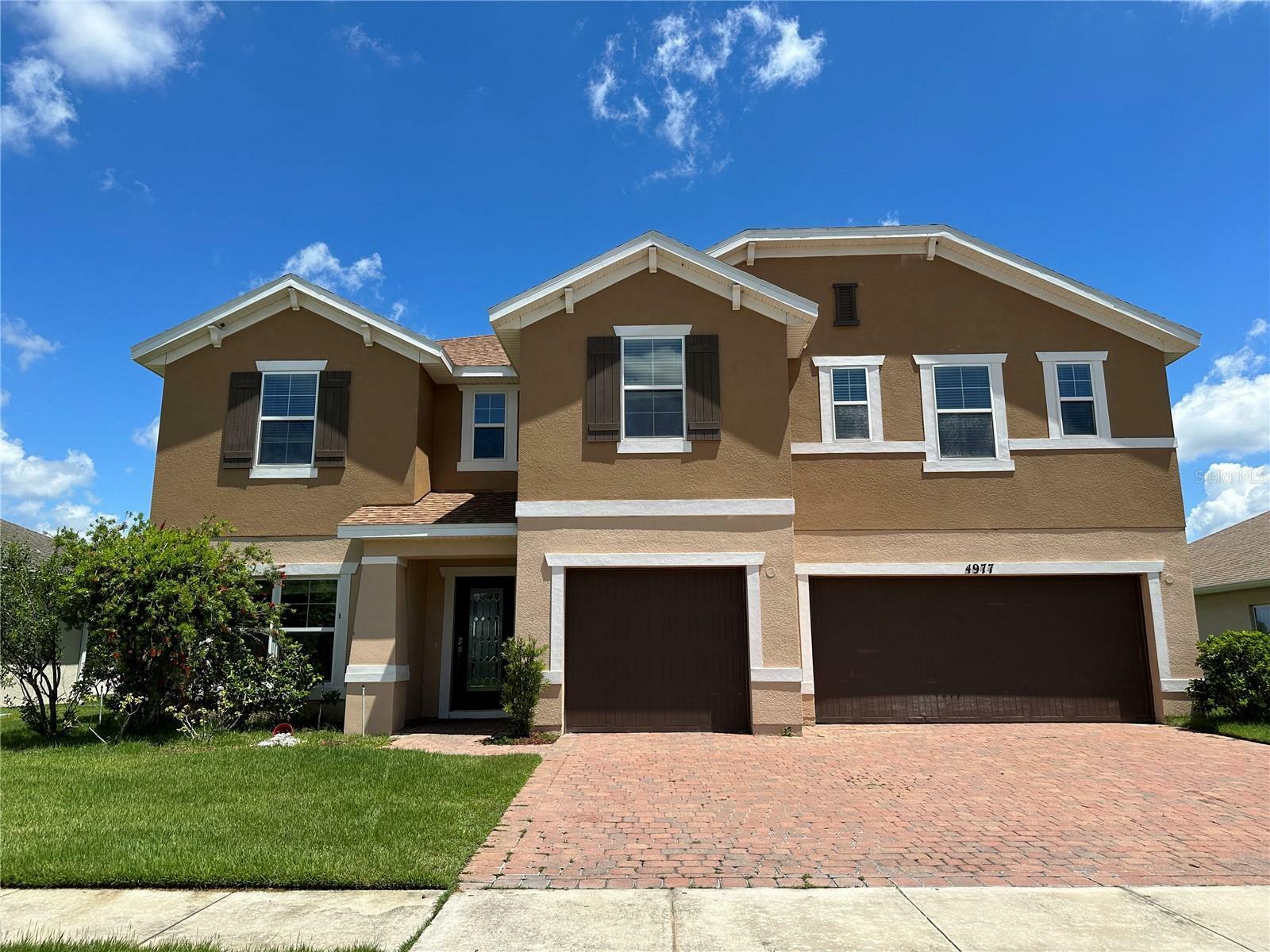 Property Photo:  4977 Whistling Wind Avenue  FL 34758 