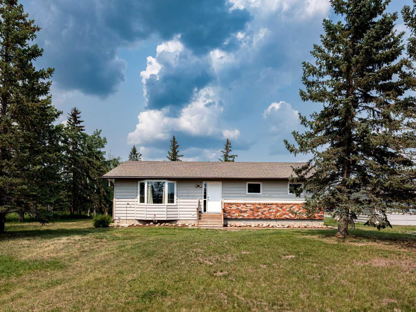Property Photo: 270140 Inverlake Road AB T1Z 0V6