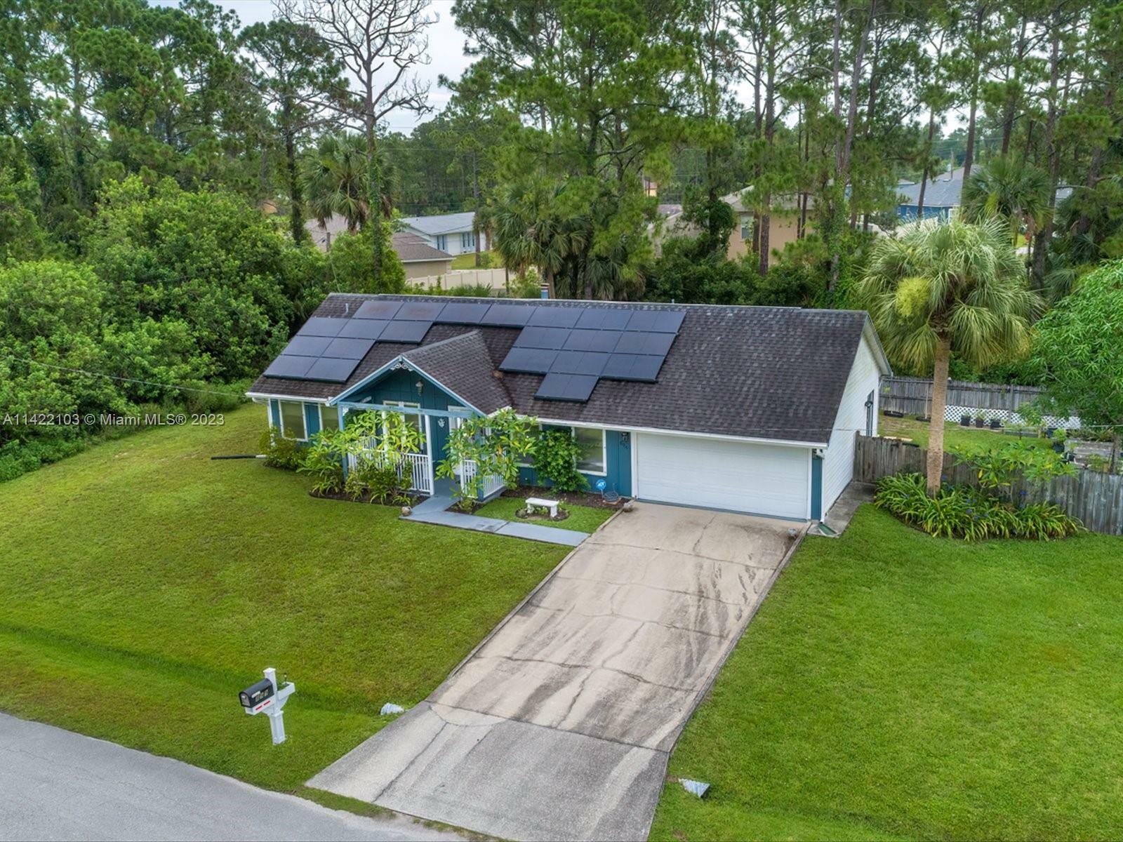 Property Photo:  899 SW Gena Road  FL 32908 