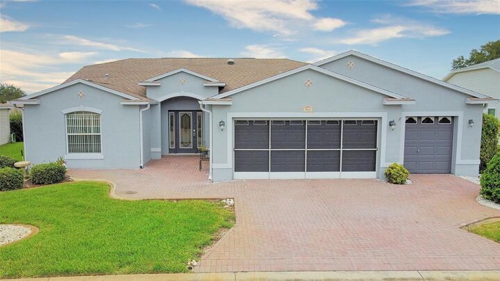 Property Photo: 943 Forest Breeze Path FL 34748