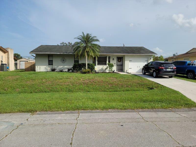 Property Photo:  822 SW Harvard Road  FL 34953 