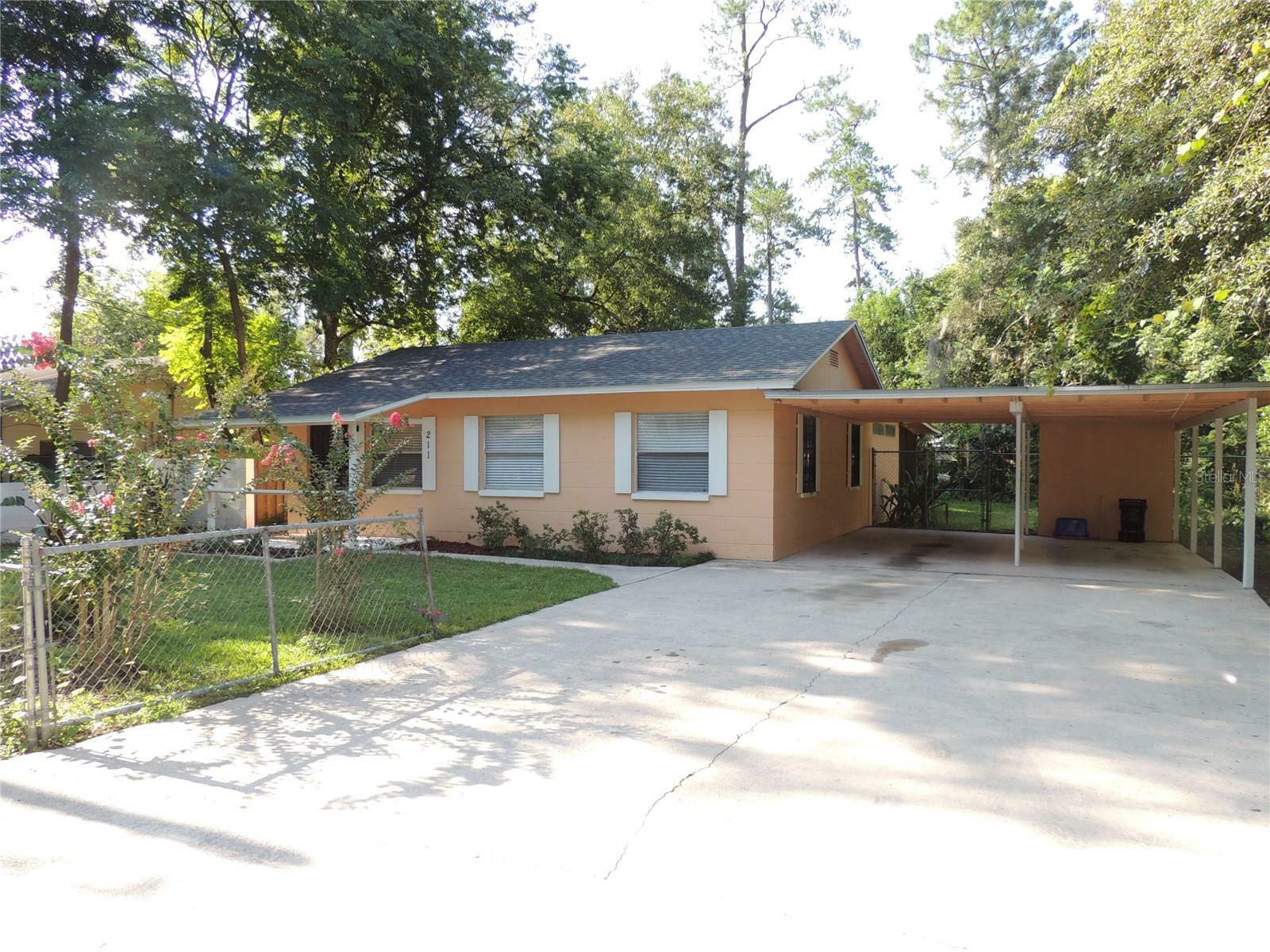 Property Photo:  211 NW 20th Avenue  FL 32609 