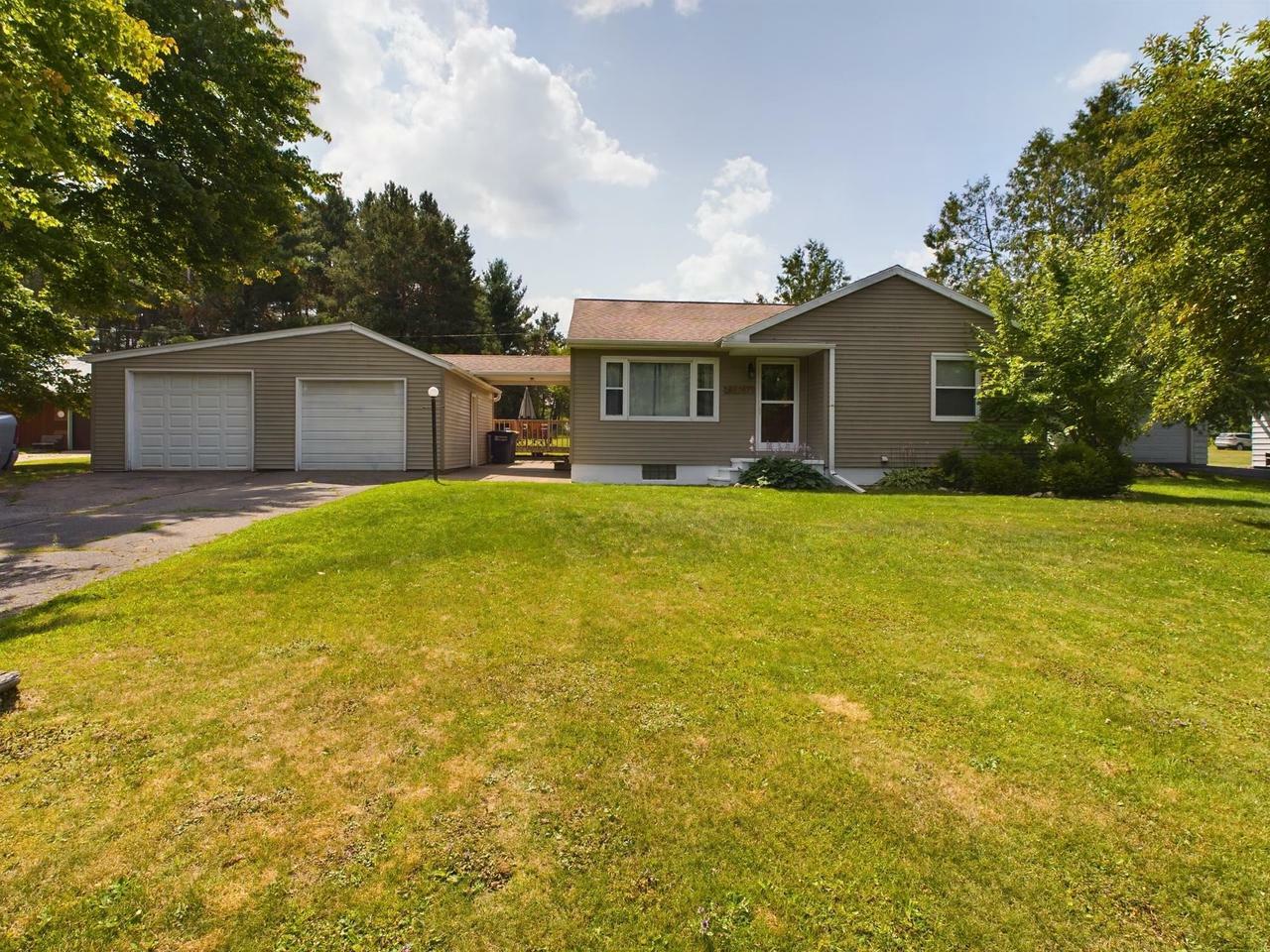 Property Photo:  W5767 Tannery Drive  WI 54452 