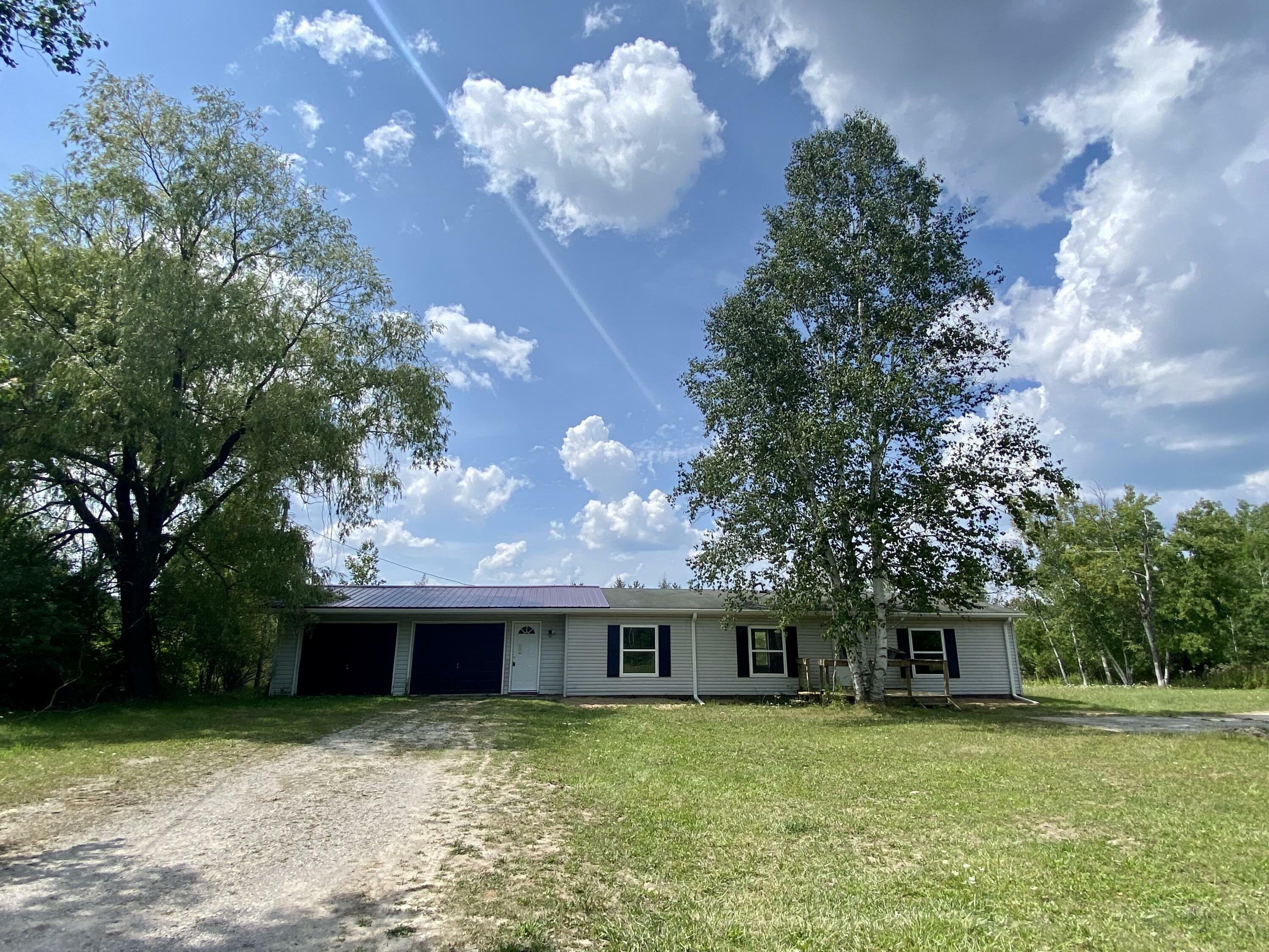 Property Photo:  4730 Belding Road  MI 49765 