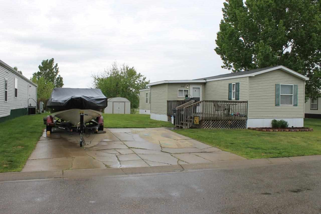 Property Photo:  406 31st Ave SE Lot 230  ND 58701 