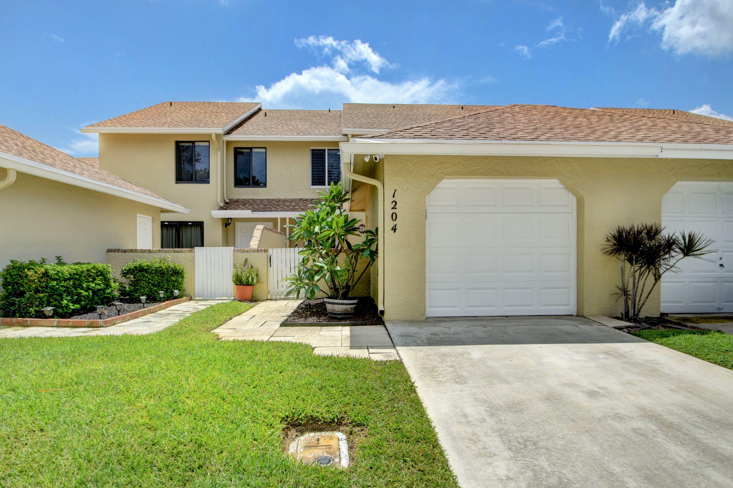 Property Photo:  1204 Maplewood Drive  FL 33415 